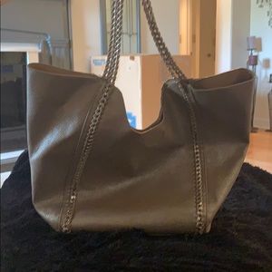 Distressed silver shoulder bag with travel bag